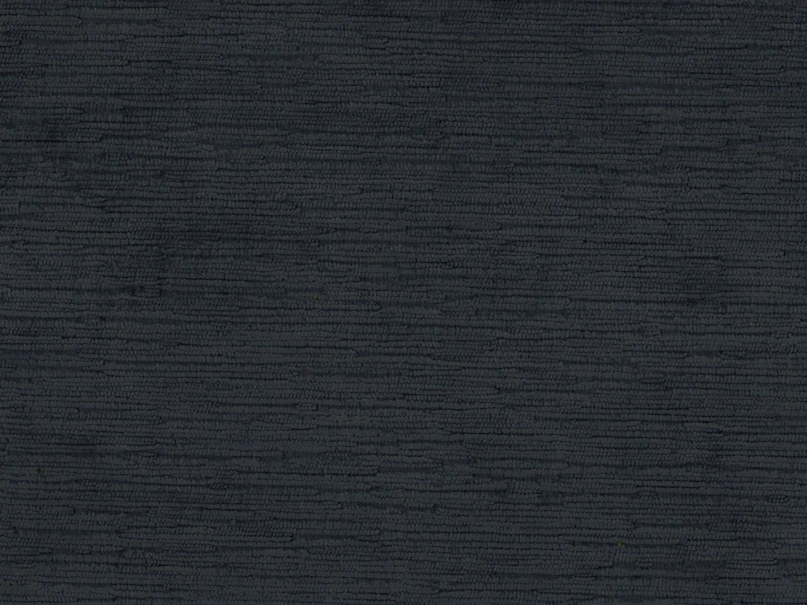 Near-black charcoal velvet with subtle horizontal striations and softly shifting pile