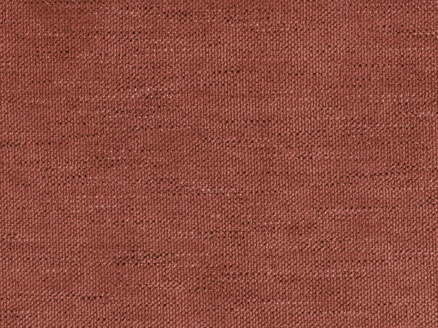 Close-up of warm terracotta-rose chenille with a fine, softly mottled weave