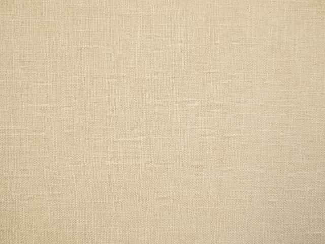Pale warm beige faux linen showing a fine, subtly textured plain weave