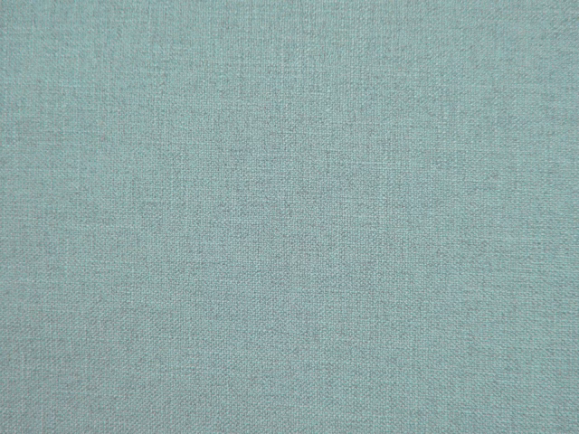 Close-up of pale seafoam teal faux-linen weave with subtle crosshatch texture