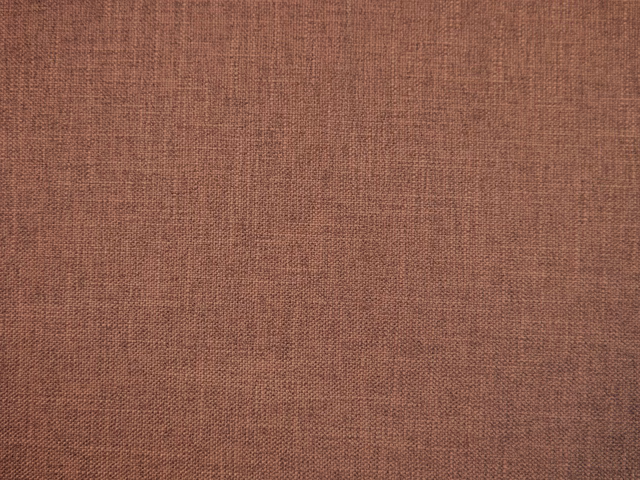 Muted terracotta-brown faux linen with a fine, irregular crosswoven texture