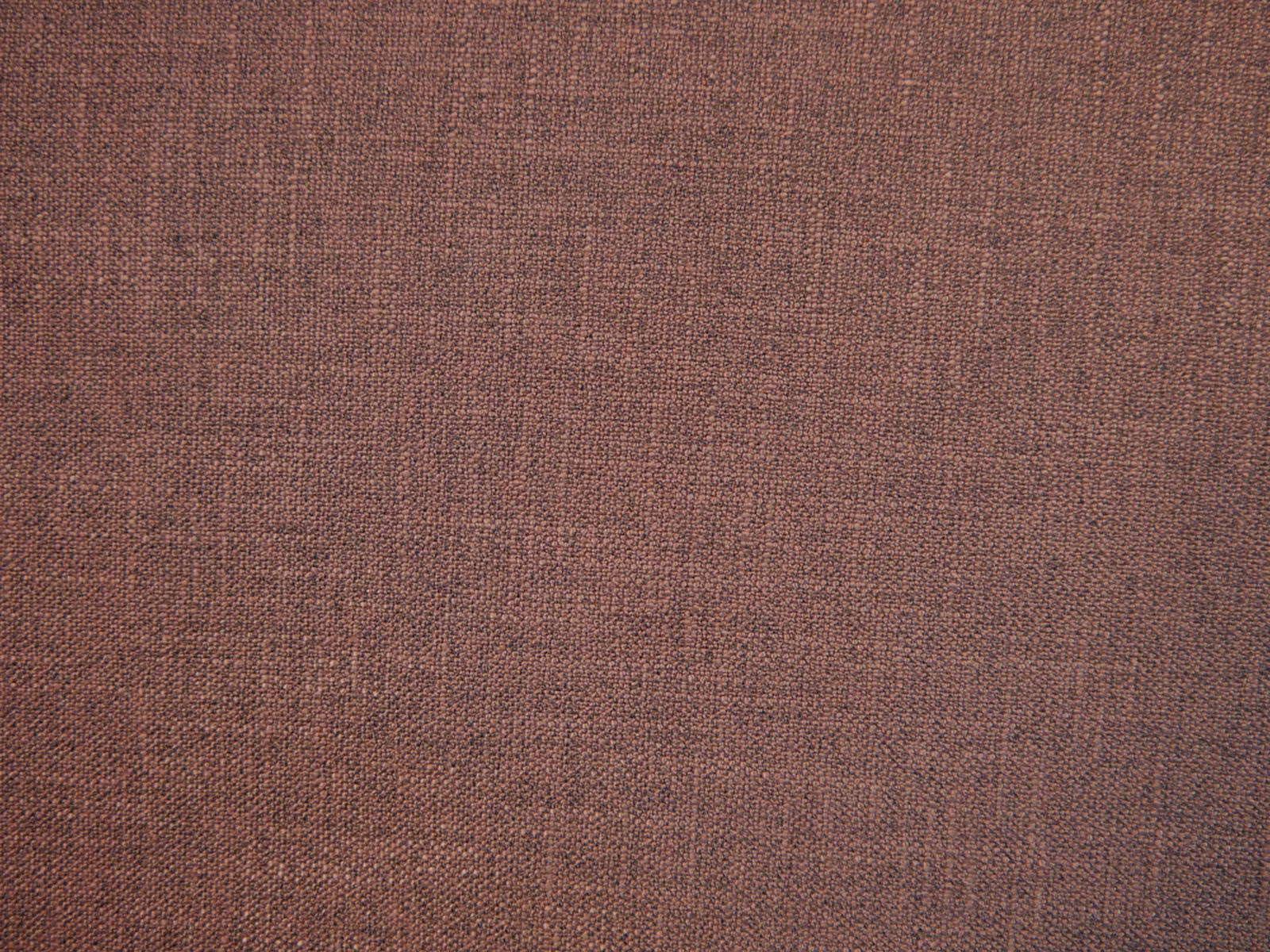 Close-up of muted rose-brown faux linen with a fine, subtly varied weave