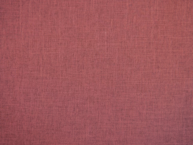 Dusty berry-pink faux-linen weave with fine crosshatch texture and subtle tonal variation
