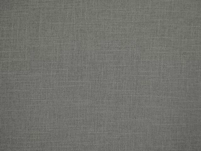 Muted mid-grey faux linen showing a fine crosshatched weave and heathered surface