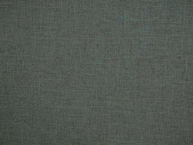 Muted charcoal-sage faux linen showing a fine, softly mottled woven texture