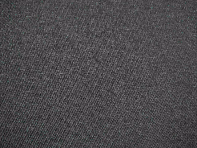 Charcoal grey faux linen weave with subtle teal flecks and fine crosshatch texture