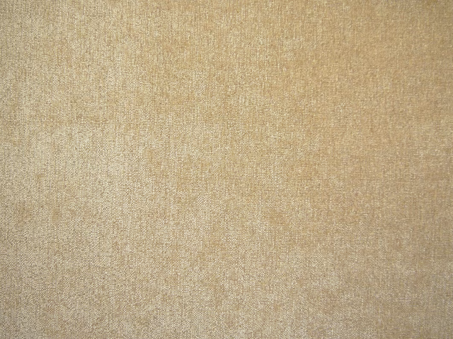 Warm oatmeal-beige chenille with subtle vertical tonal texture in close-up