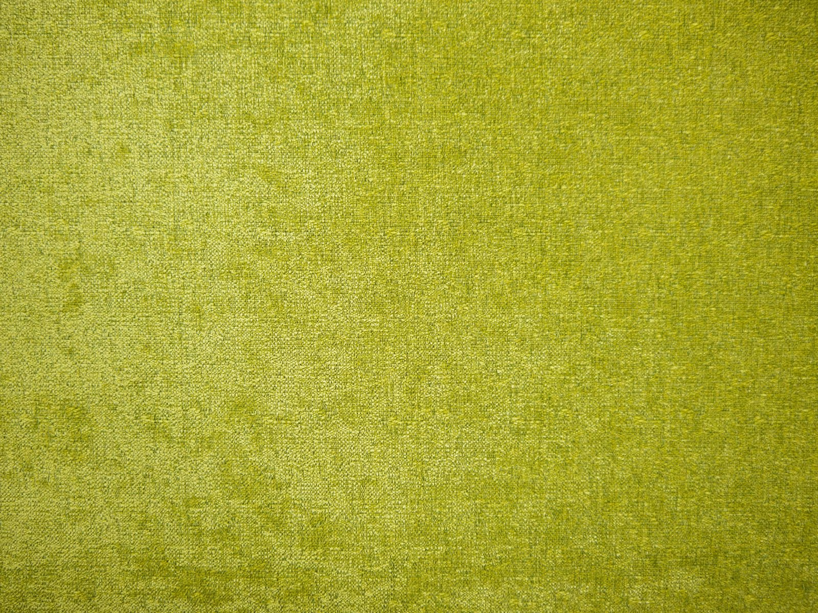 Luminous chartreuse green chenille with softly mottled, tactile woven texture