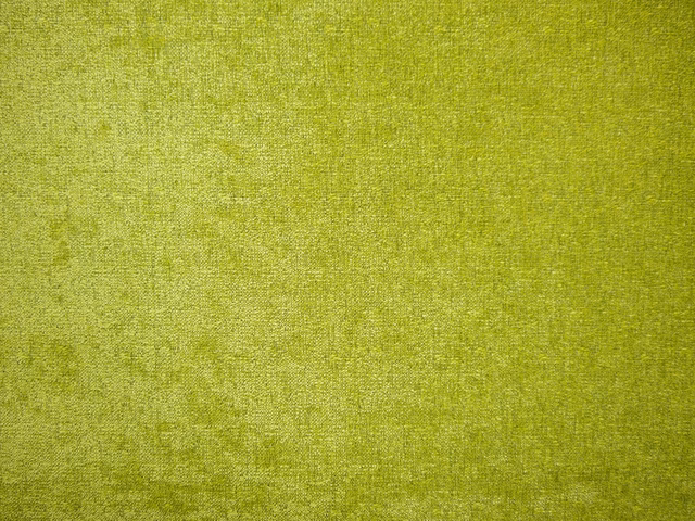 Luminous chartreuse green chenille with softly mottled, tactile woven texture