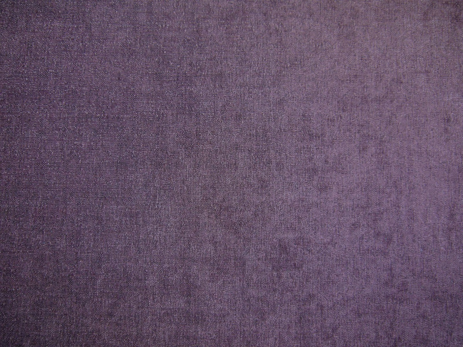 Dusky plum-purple chenille with a softly mottled, finely textured weave