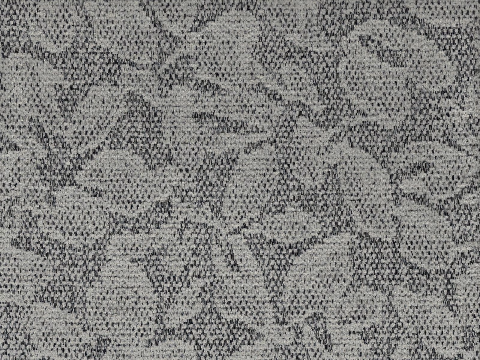 Cool grey chenille with mottled charcoal leaf-like outlines and a nubby woven surface