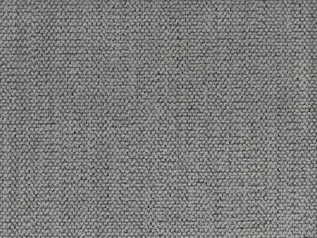 Close-up of cool grey chenille with a dense nubby charcoal-mottled weave