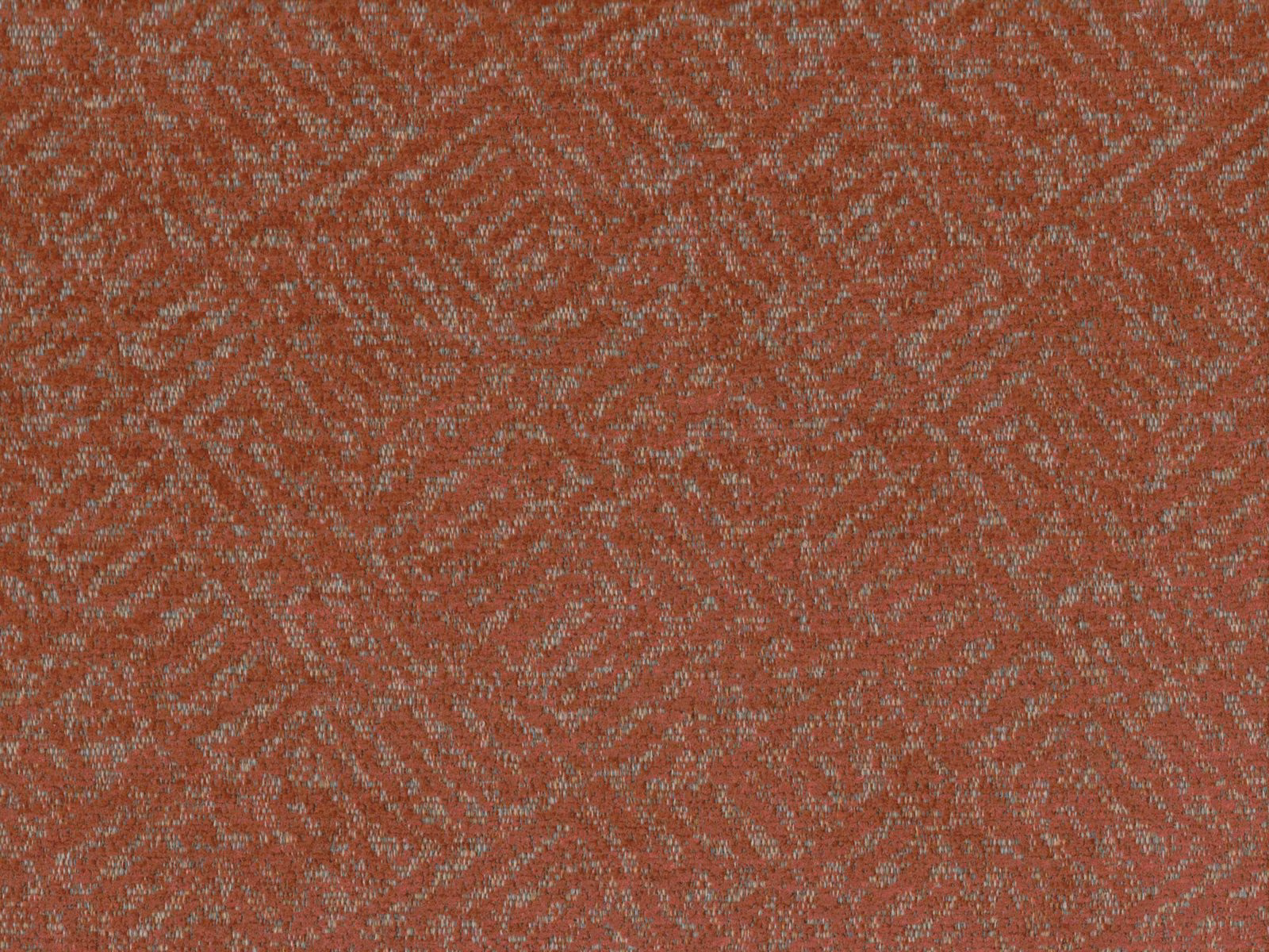Muted rust terracotta chenille with fine grey flecks and an irregular woven motif