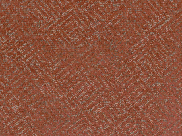 Muted rust terracotta chenille with fine grey flecks and an irregular woven motif