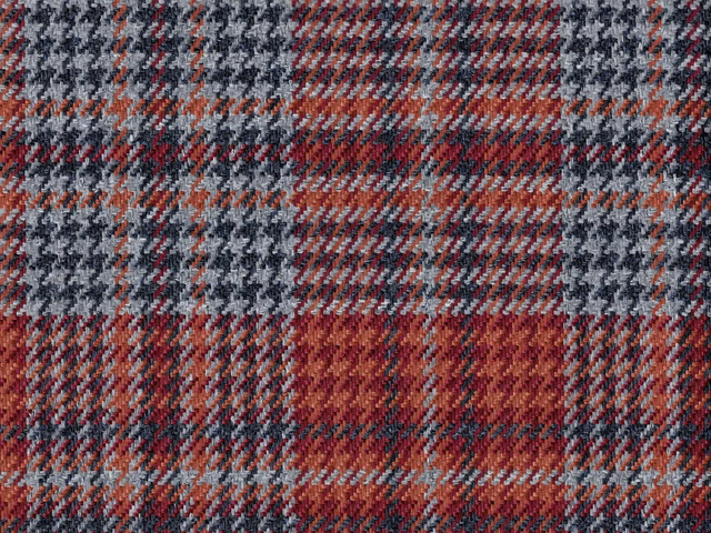 Muted rust, charcoal and grey checked flat weave with diagonal woven texture