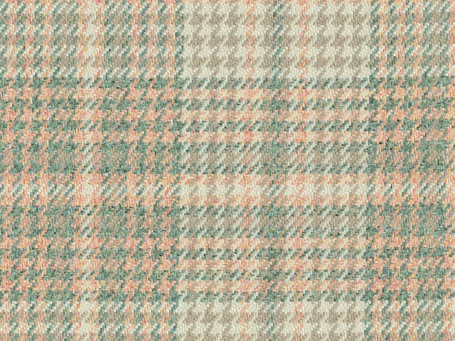 Close-up of sage, blush and cream irregular flat weave with broken bands