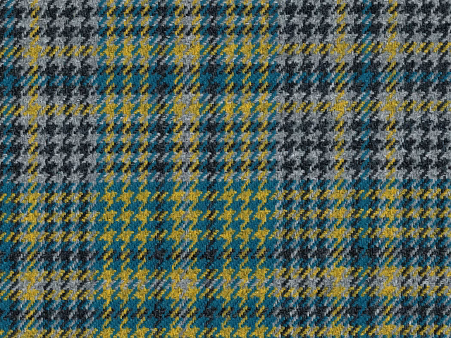 Teal, mustard, charcoal and cream irregular checked flat-weave fabric close-up