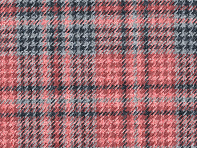 Dusky pink and charcoal checked flat weave with a softly textured surface