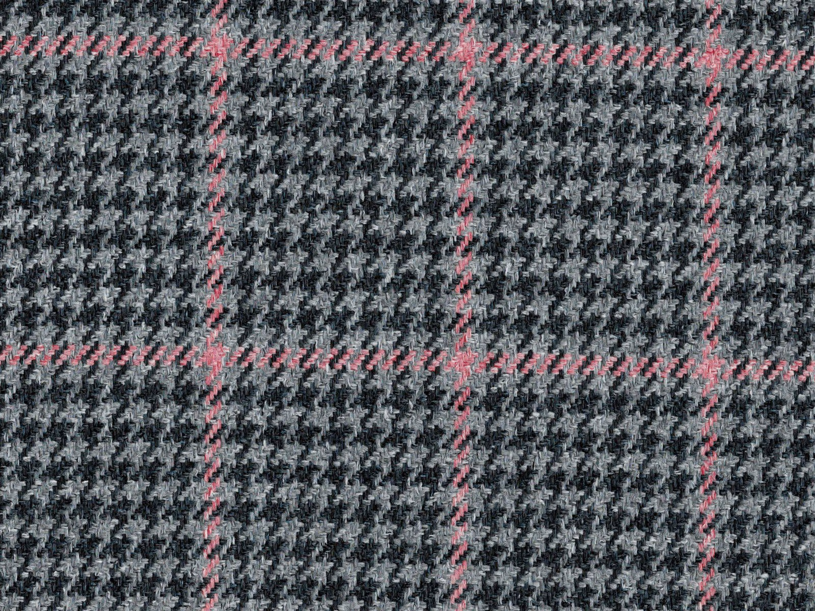 Charcoal grey houndstooth check with fine pink windowpane lines in a textured flat weave