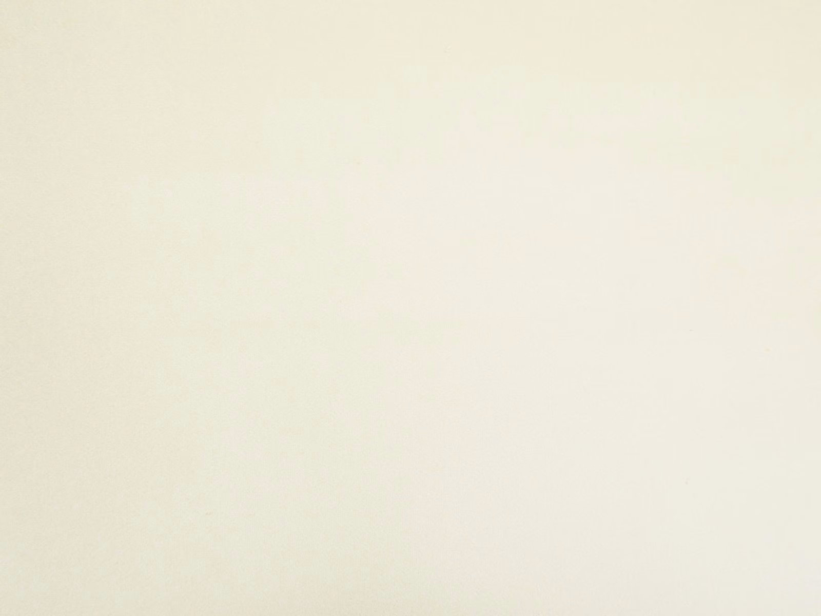 Pale ivory cream velvet with a smooth nap and softly shaded plain surface