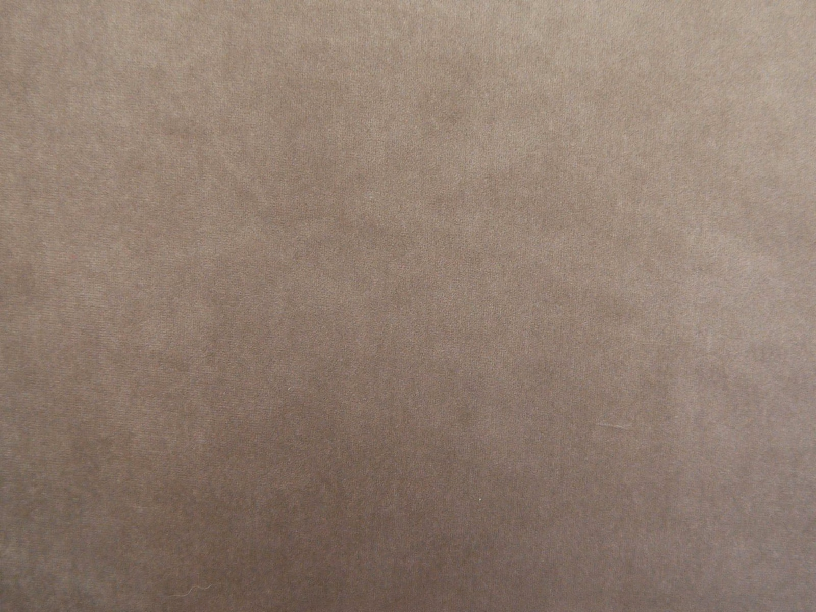 Mushroom taupe velvet swatch showing subtle nap variation and a plain surface