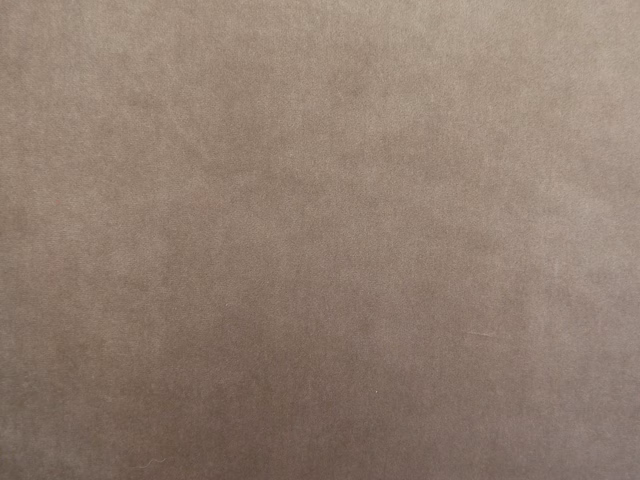Mushroom taupe velvet swatch showing subtle nap variation and a plain surface