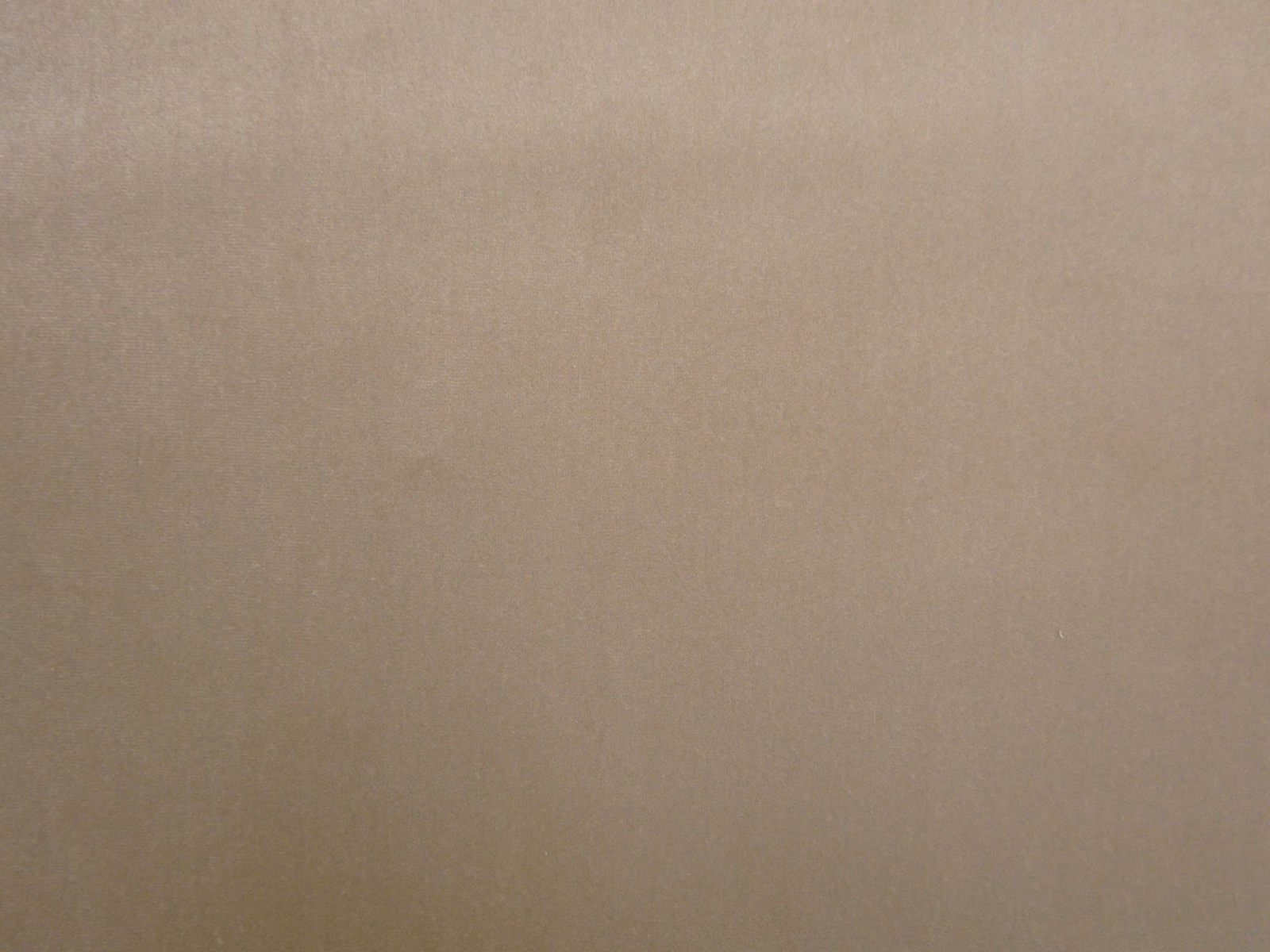 Plain warm taupe velvet with a soft nap and subtle light-catching sheen