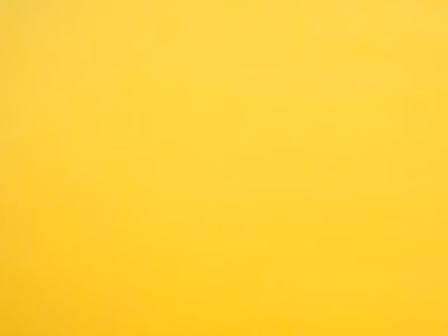 Warm golden yellow velvet with a softly shifting plain pile and subtle sheen