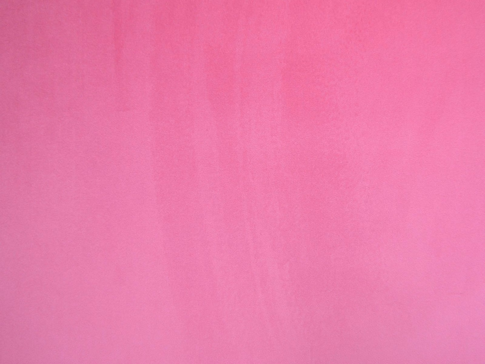 Saturated raspberry-pink velvet swatch with subtle vertical nap and soft sheen