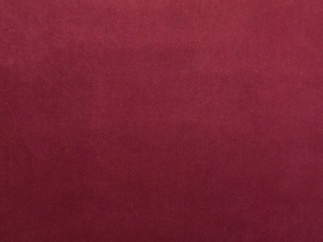 Deep burgundy plain velvet swatch showing soft pile and subtle nap variation