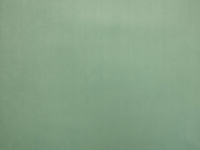 Muted seafoam teal velvet swatch showing a soft, subtly varied plain pile