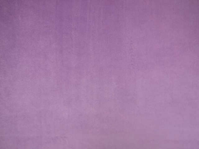 Dusty mauve-purple plain velvet with subtle vertical nap variation