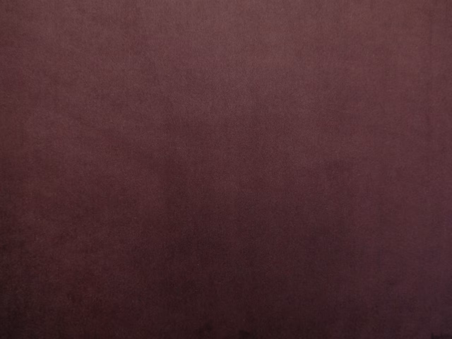 Deep burgundy velvet with softly shifting nap and subtle plum shading