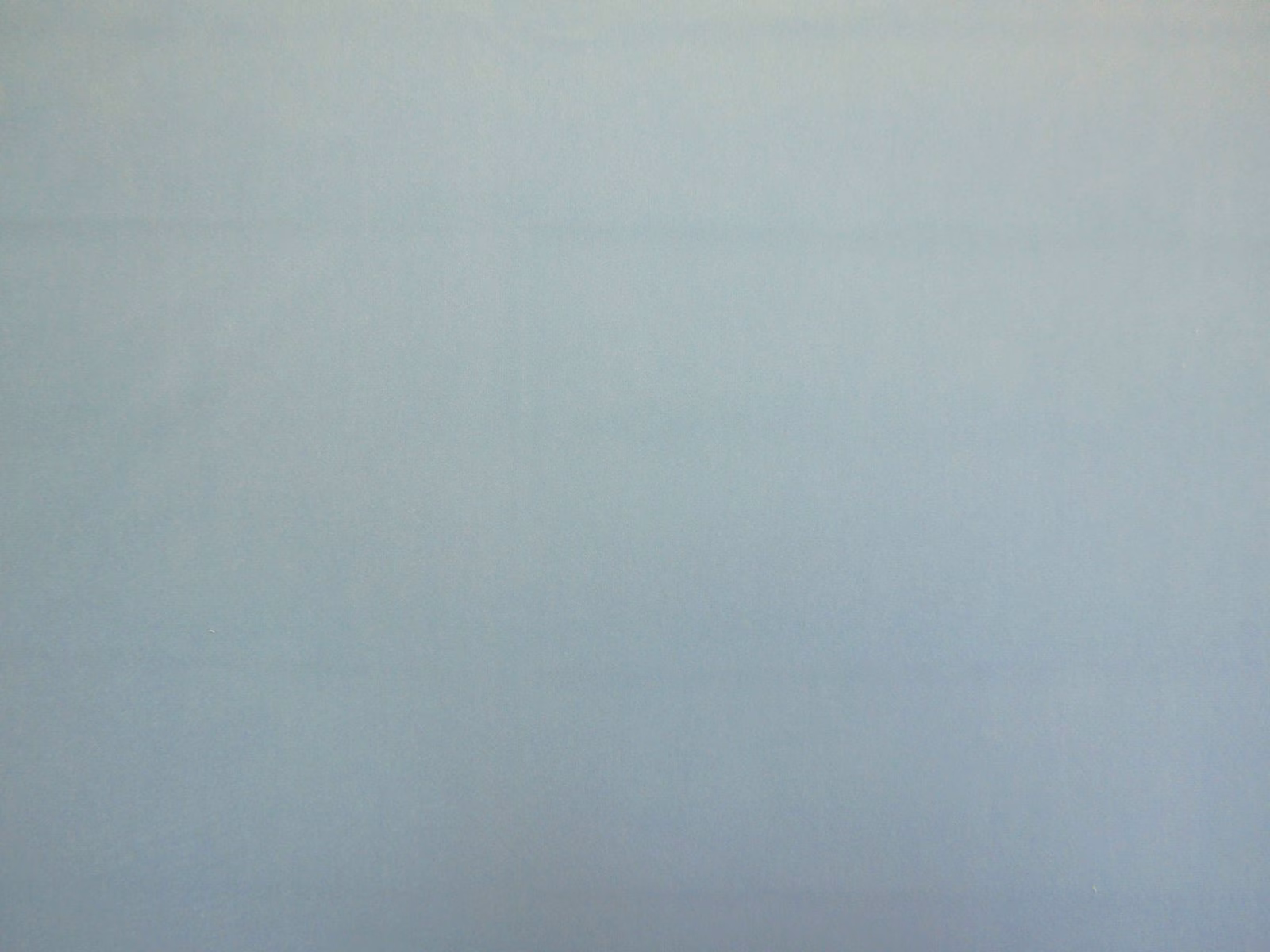 Pale blue-grey velvet with a soft, subtly shifting nap across the swatch