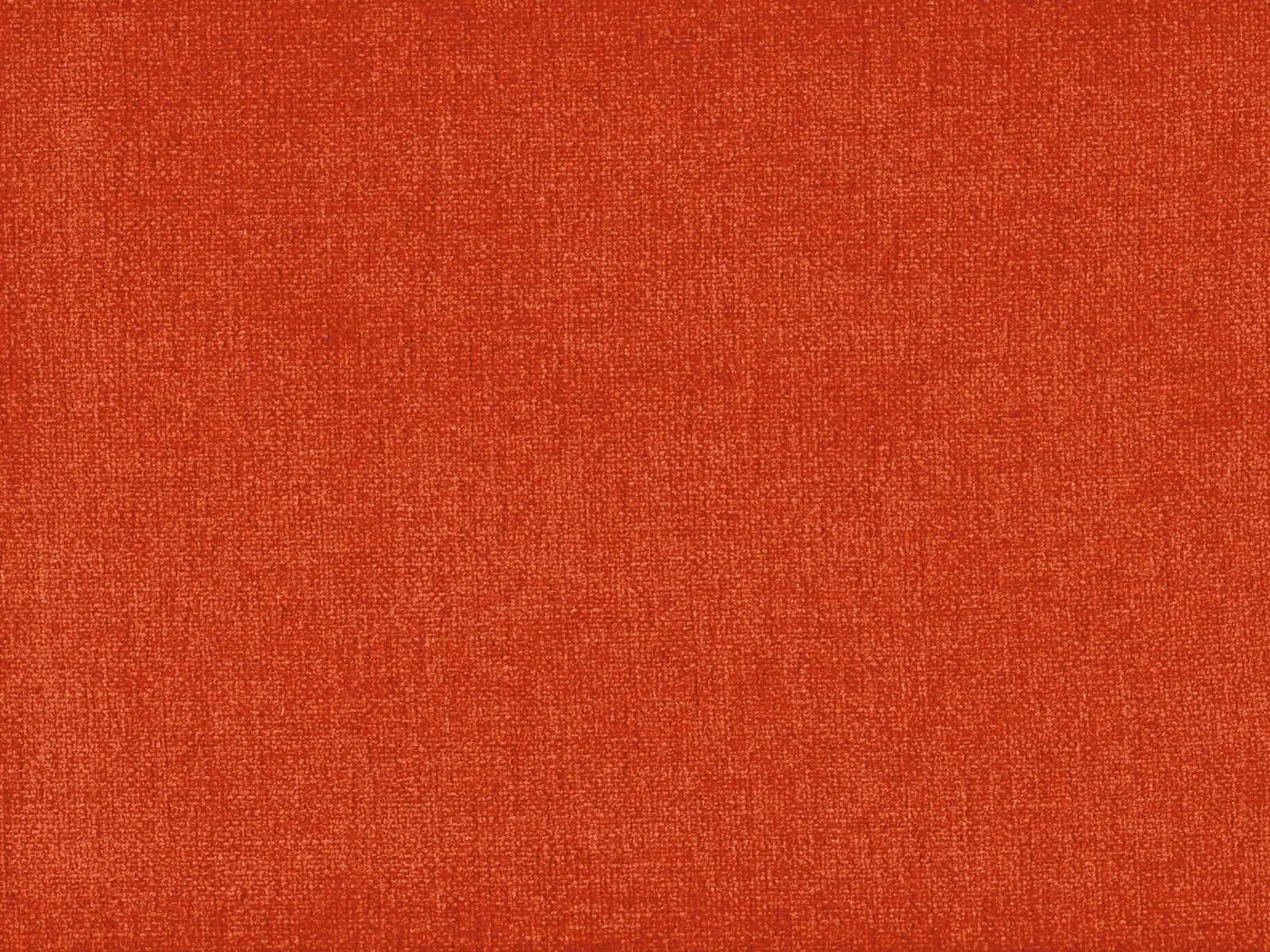 Burnt terracotta-red chenille with a fine, softly varied woven texture