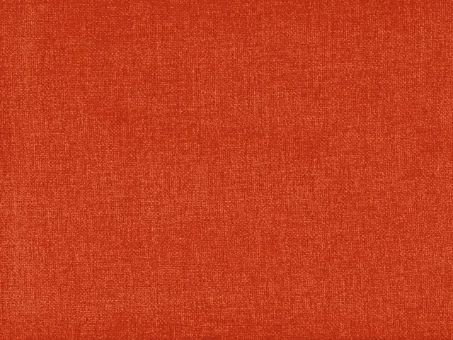 Burnt terracotta-red chenille with a fine, softly varied woven texture