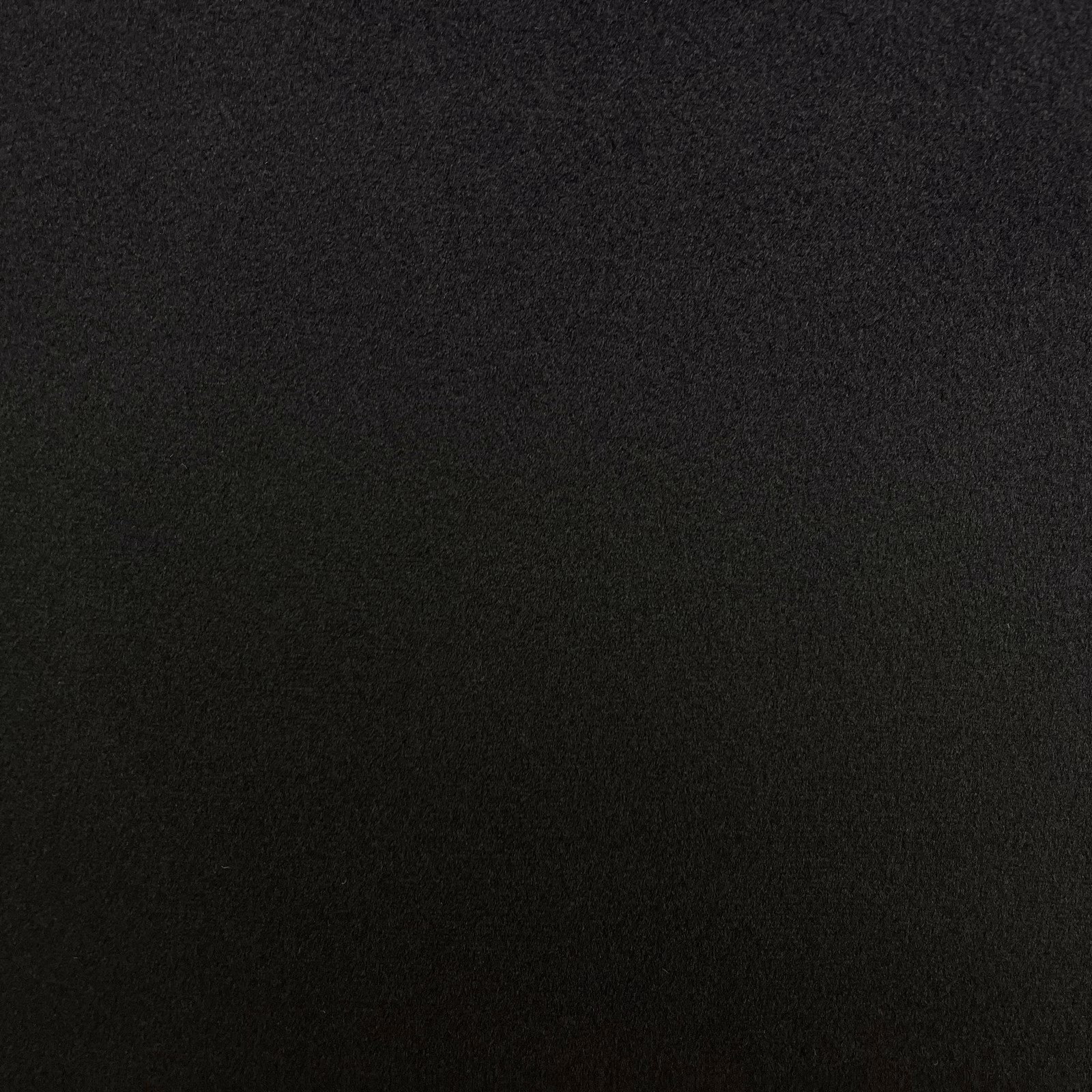Deep charcoal-black chenille swatch showing a fine, subtly textured surface
