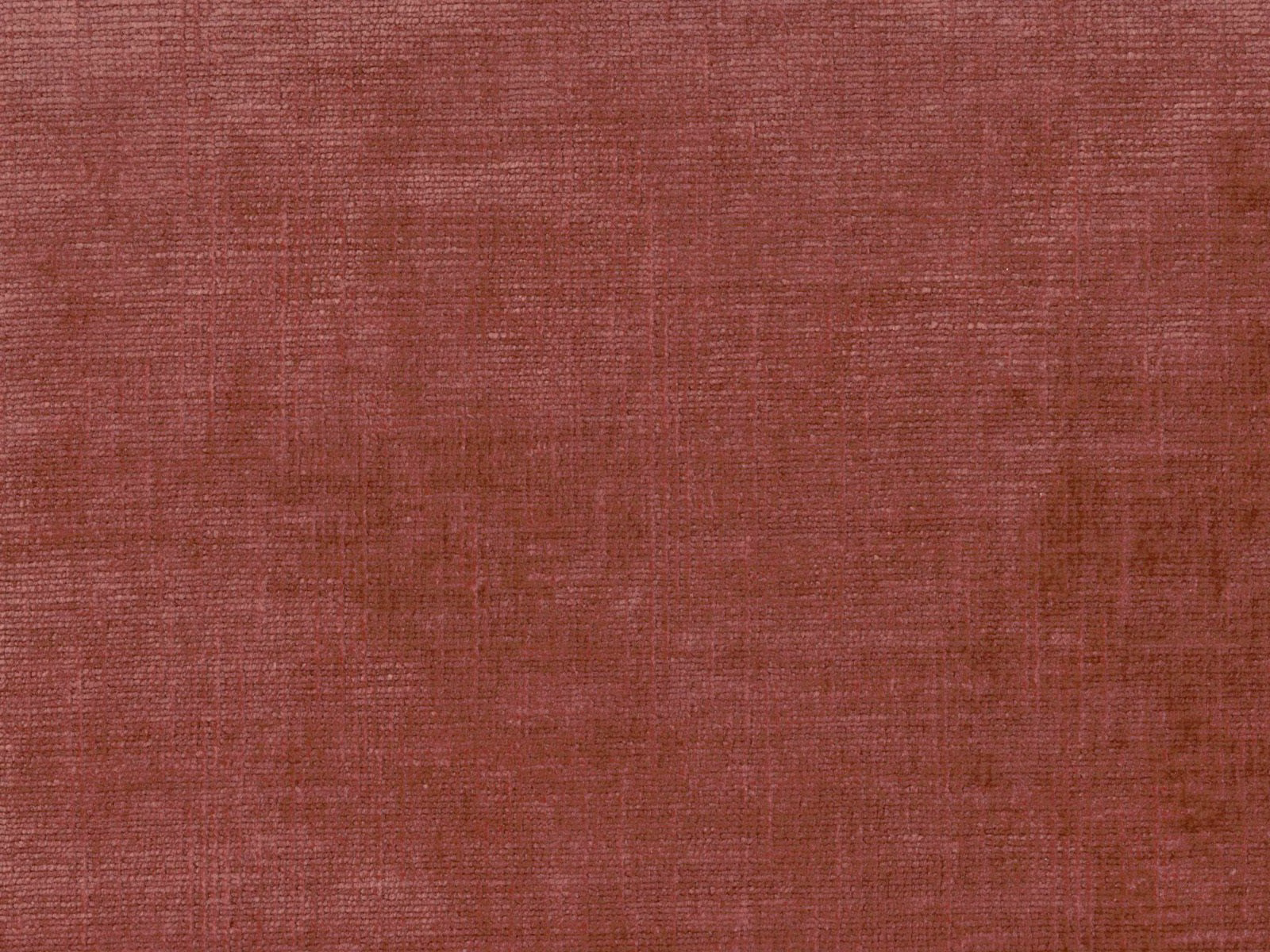 Dusty berry-red chenille with a fine crosswoven texture and softly shaded surface