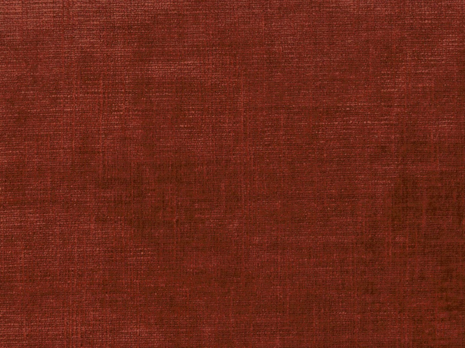 Deep russet burgundy chenille showing fine crosshatched texture and tonal striations