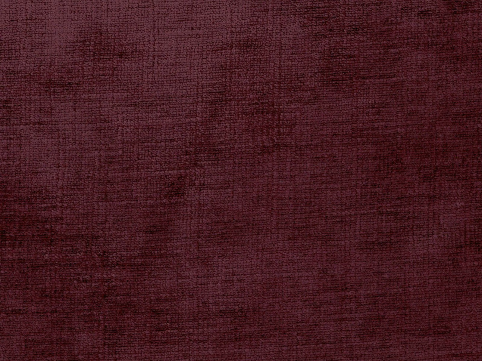 Deep burgundy chenille with subtle irregular striation and a softly plush surface