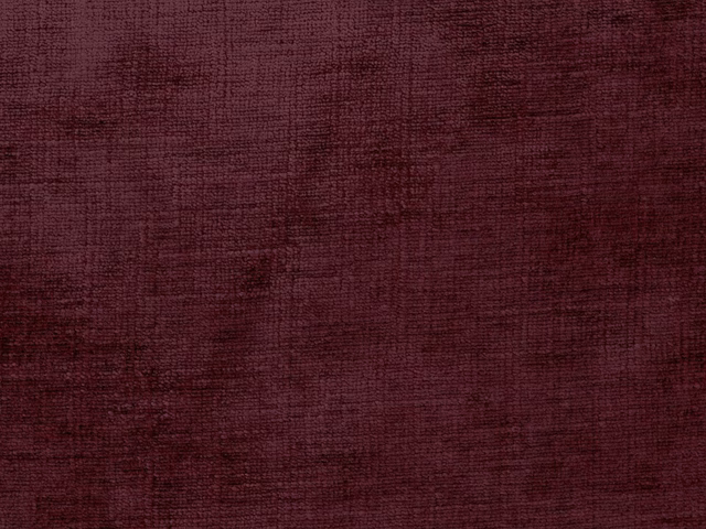 Deep burgundy chenille with subtle irregular striation and a softly plush surface