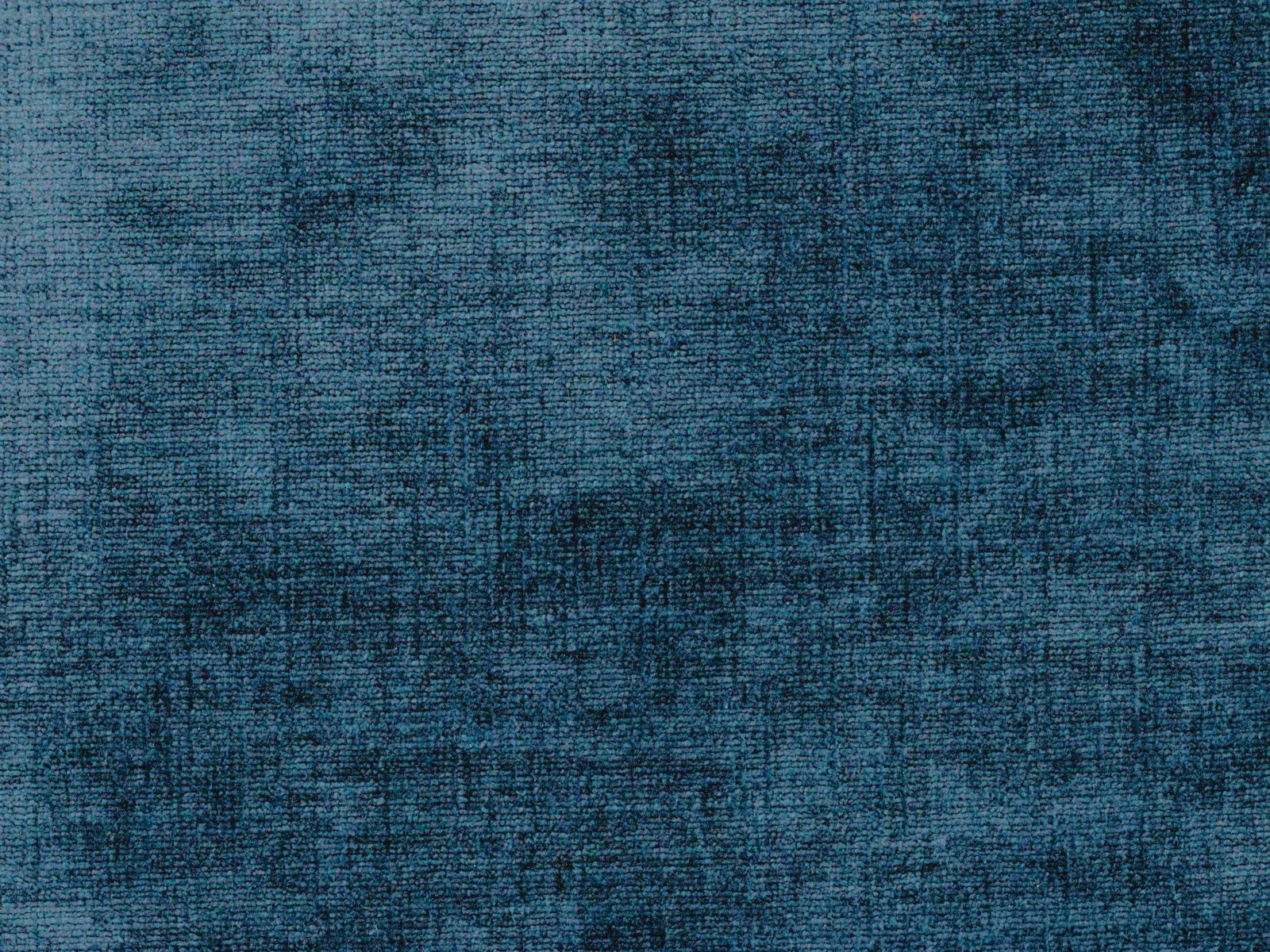 Deep teal-blue chenille with a softly mottled, crosshatched surface
