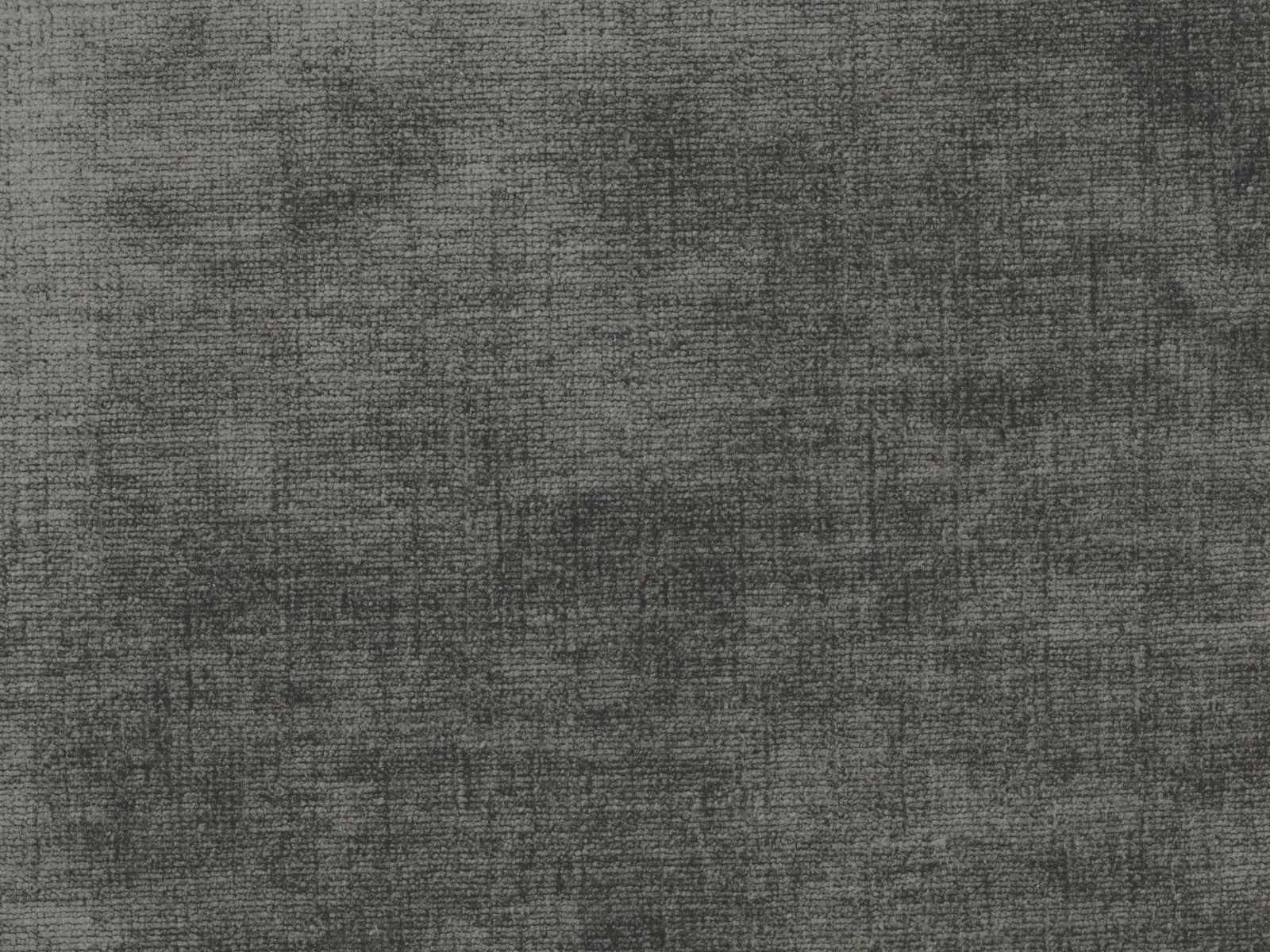 Charcoal-grey chenille with a fine mottled crosshatch texture in close-up