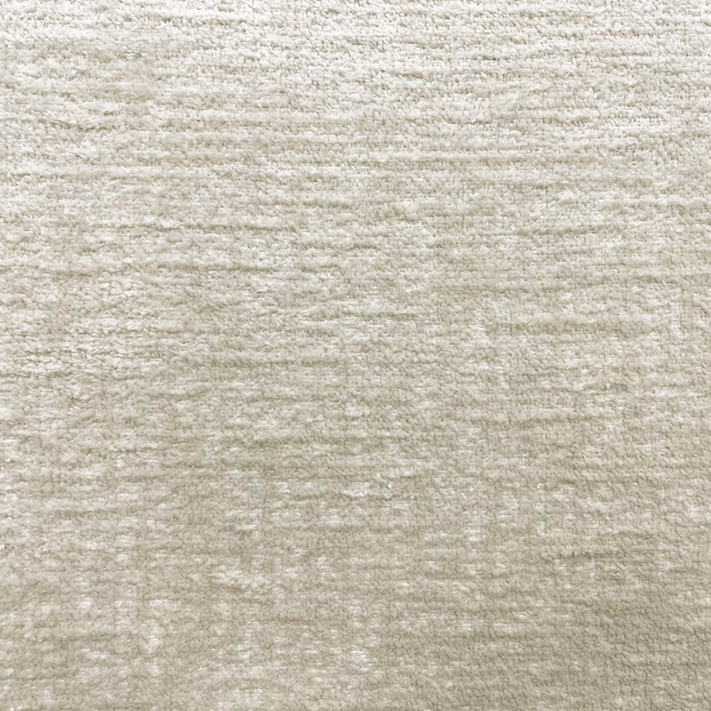 Pale warm greige chenille with softly mottled horizontal texture and subtle woven variation