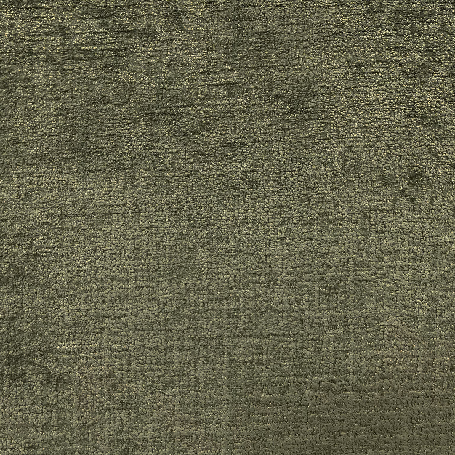 Close view of muted olive green chenille with a softly nubby, flecked weave