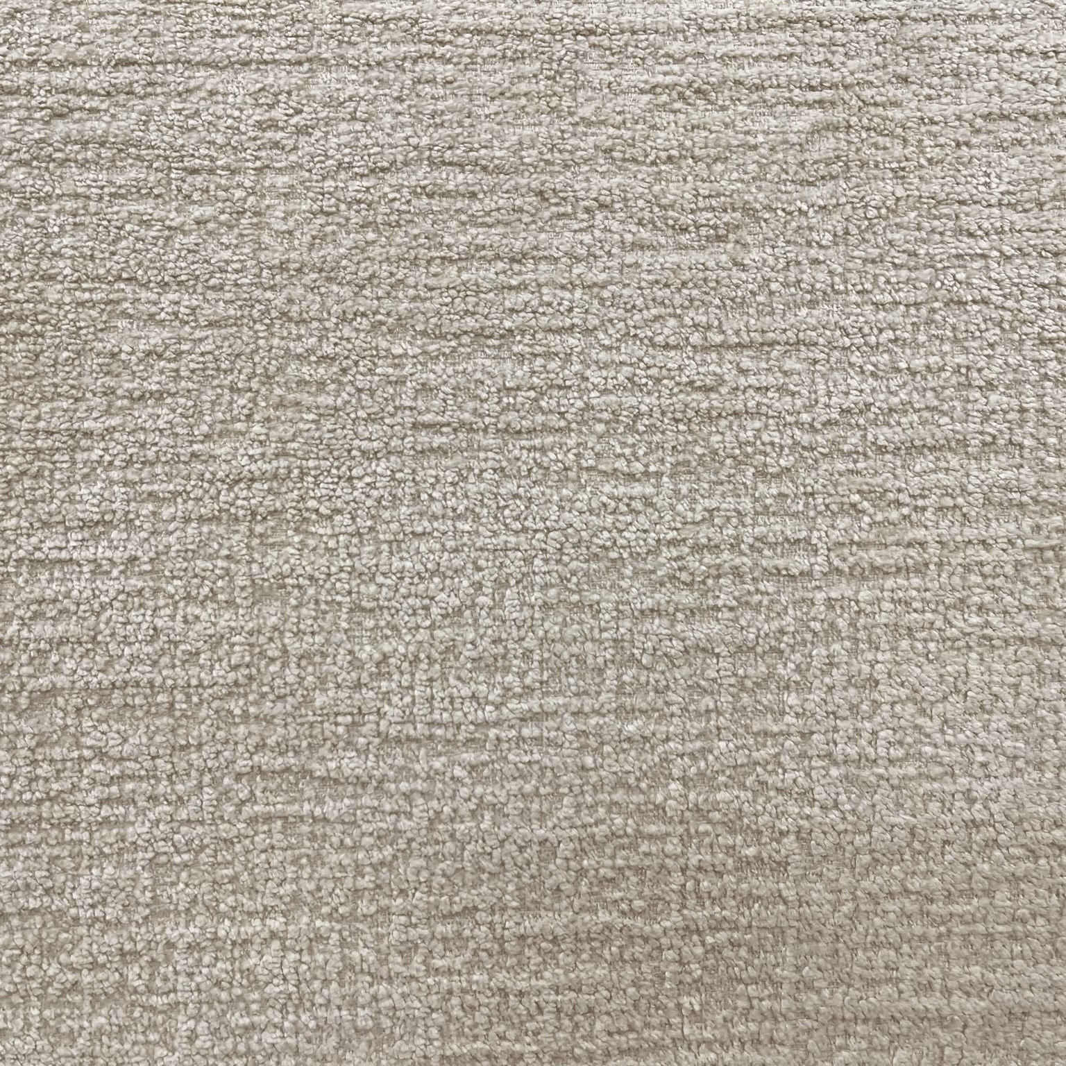 Warm greige chenille with fine flecked horizontal texture and softly nubby surface