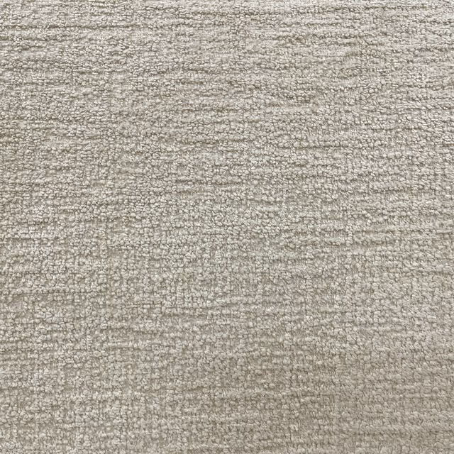 Warm greige chenille with fine flecked horizontal texture and softly nubby surface