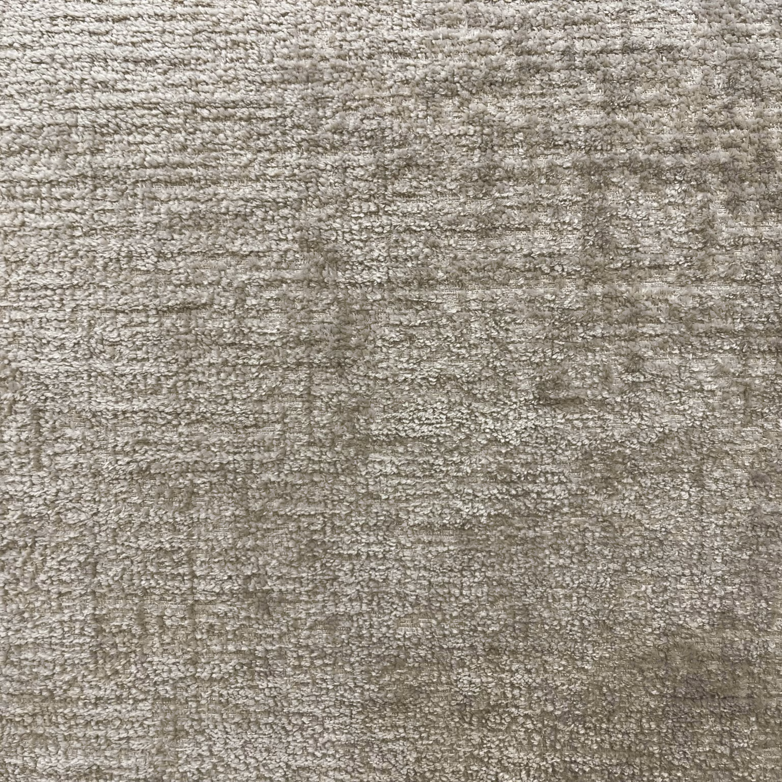 Mottled taupe-grey chenille with irregular horizontal texture and softly varied depth