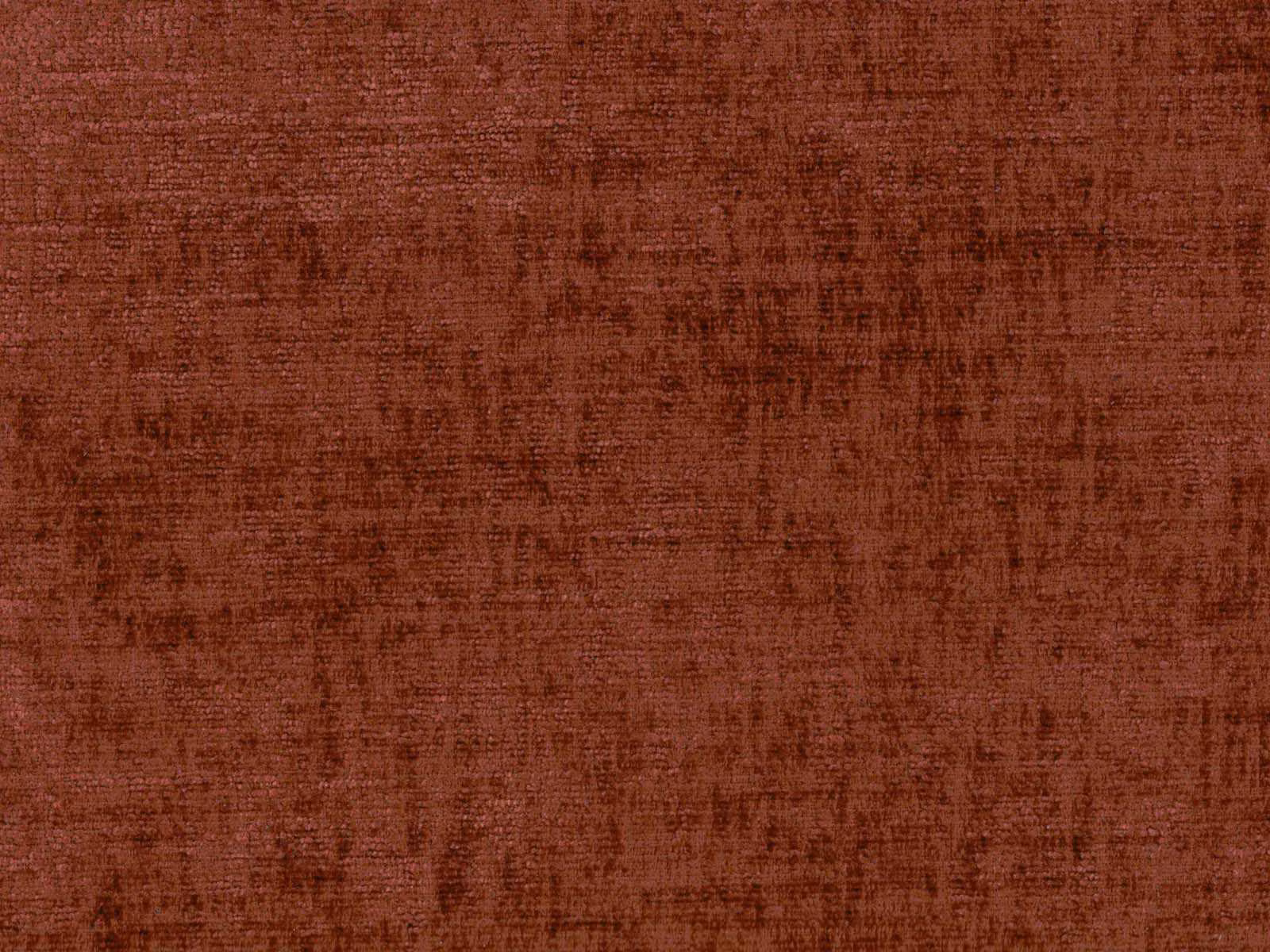 Close-up of deep rust terracotta chenille with a softly mottled brushed texture