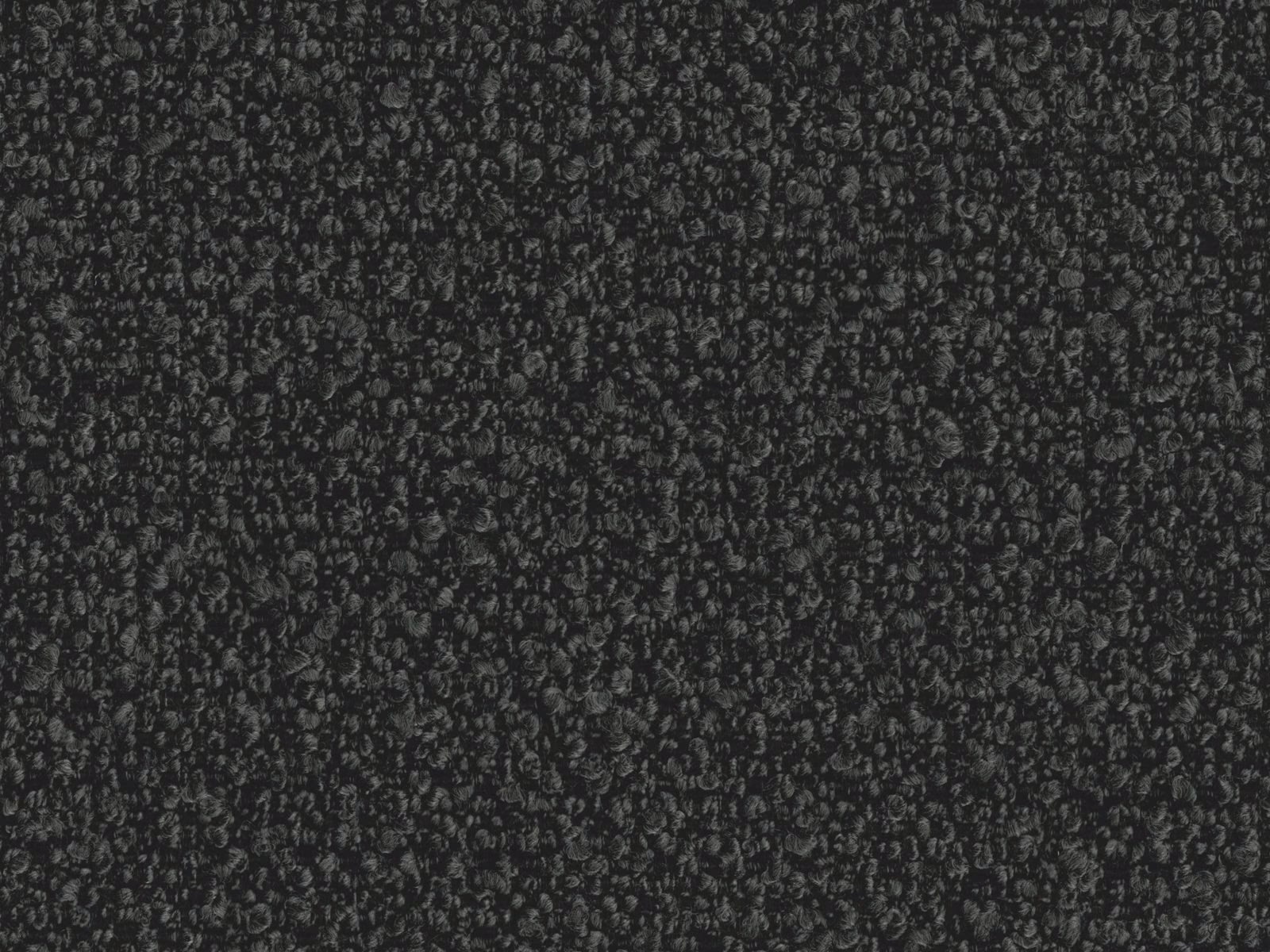 Near-black charcoal boucle with dense looped texture and subtle grey flecks